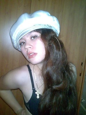 Beautiful Kazakhstan girl with a white hat