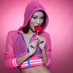 Young foreign girl with lollipop