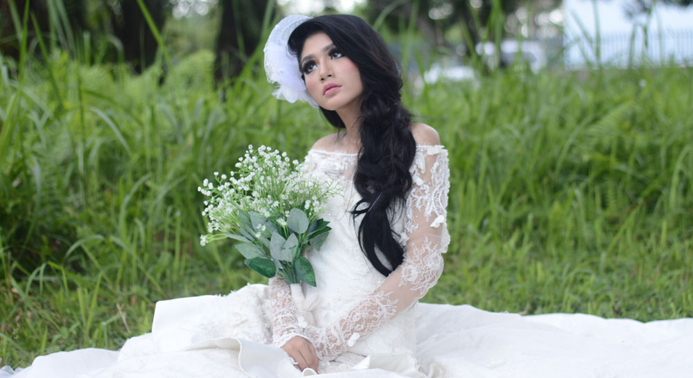 Beautiful Asian woman in bridal gown