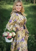 cute Moldovan fitness trainer in a floral dress