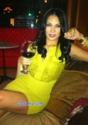 Dominican girl drinking wine