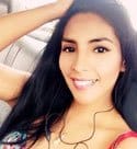 Peruvian beauty posing inside the car