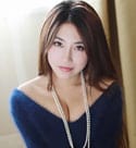 sexy Chinese artist in a blue dress