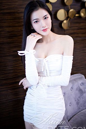 Chinese doll in a white off shoulder dress