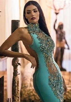 Colombian girl in green tight fitting dress