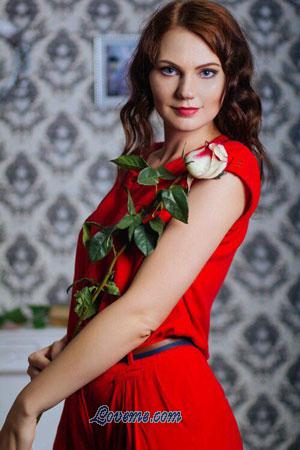 cute kazakh babe in red dress holding a rose