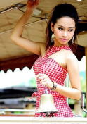 cute Thai girl holding a bell