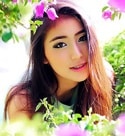 desirable Thailand girl in a flower garden
