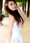 desirable Viet girl in a simple white dress