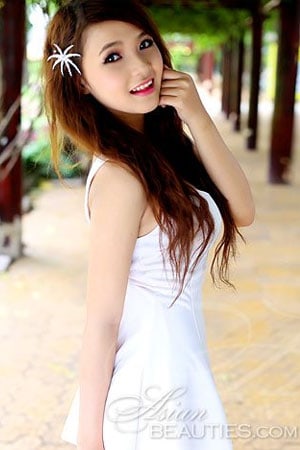 desirable Viet girl in a simple white dress