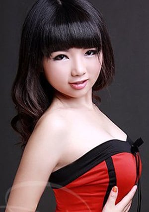 foxy China babe wearing a stunning red dress
