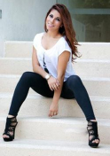 gorgeous Mexican girl sitting on the stairs