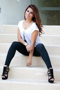 gorgeous Mexican girl sitting on the stairs