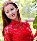 Huynh Tram from Vietnam wearing a long red dress