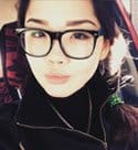 Kazakh girl looking pretty in glasses