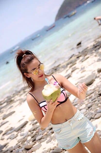 Kimmy drinking fresh coconut