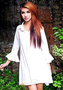 provocative Thai girl in white long sleeves dress