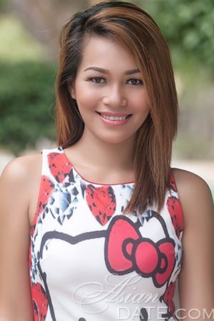 simple Filipina woman flashing a smile