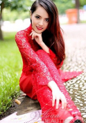 Vietnamese babe in a red traditional dress