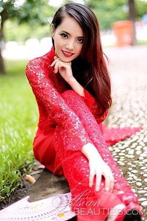 Vietnamese babe in a red traditional dress