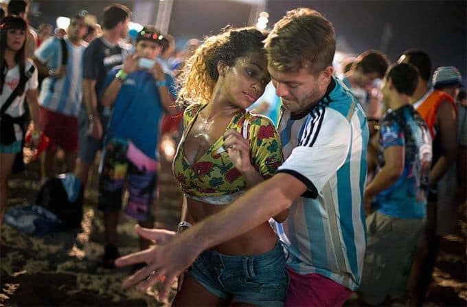 Brazilian woman dancing with partner