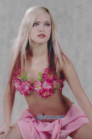 Russian blonde in flower bra and pink skirt