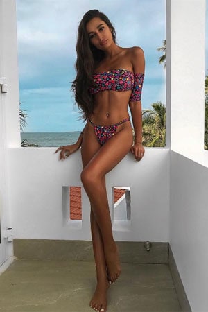 seductive Morroccan babe in a colorful polka dot bikini