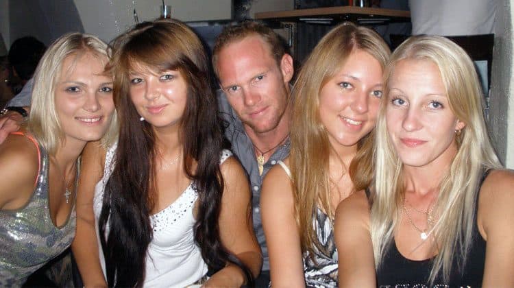 a guy surrounded with gorgeous Estonian girls