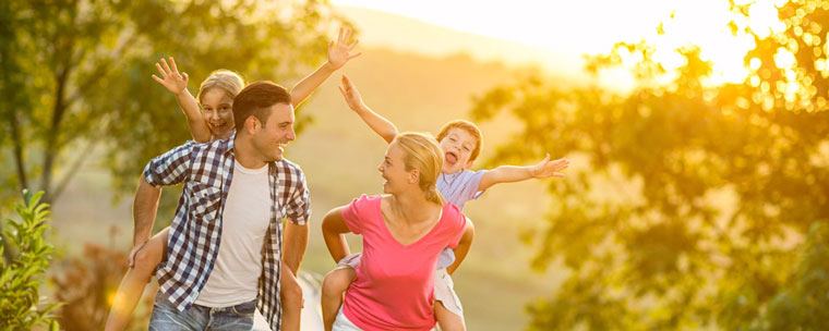 Happy family in the woods