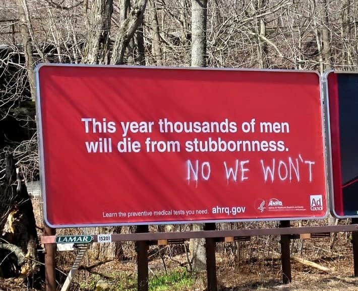 Men are stubborn road sign