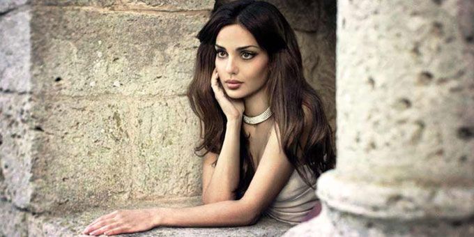 gorgeous Armenian girl posing on the window