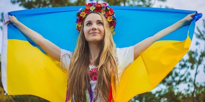 Blonde Ukraine girl with a flag