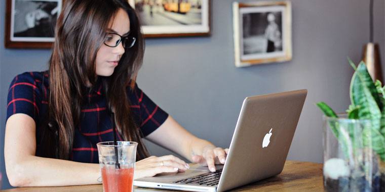 cute girl in front of computer