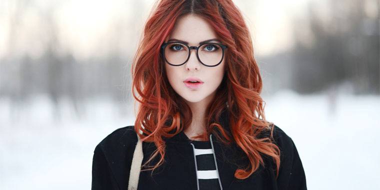 hot redhead wearing glasses