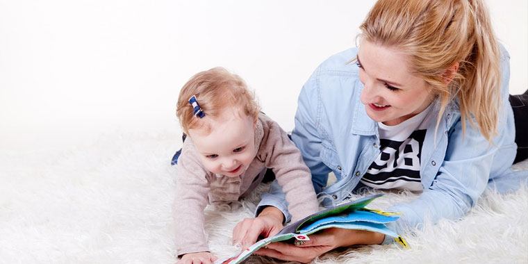 mom and daughter reading
