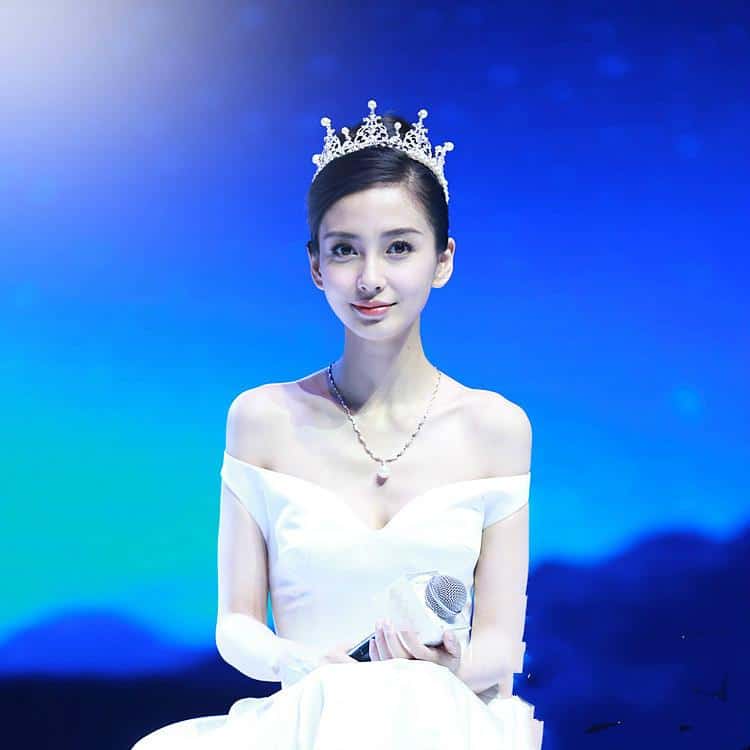 Angelababy wearing a princess pearl rhinestone crown