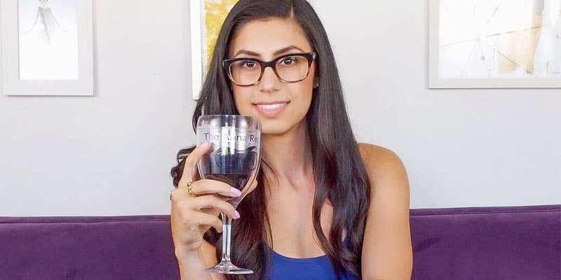 Armenian beauty holding wine glass