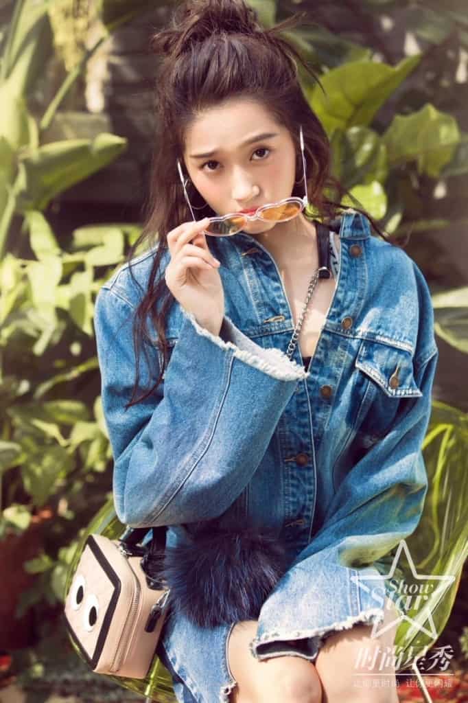 Guan Xiaotong in denim jacket