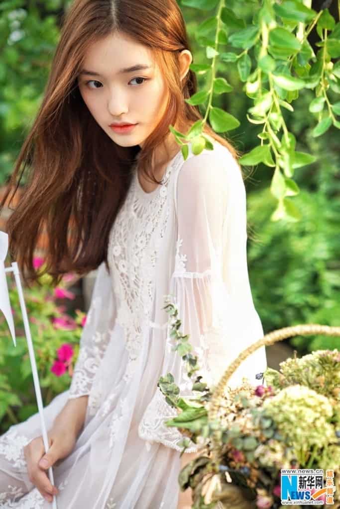 Lin Yun posing for a photo shoot