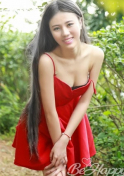 seductive Chinese babe in red dress