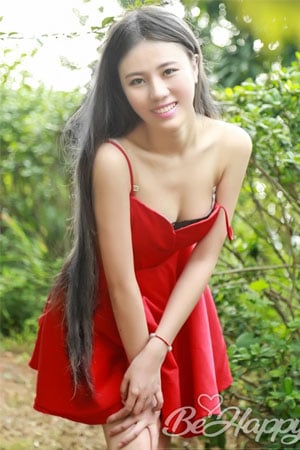 seductive Chinese babe in red dress