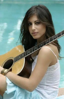 Roni Meron picture with a guitar