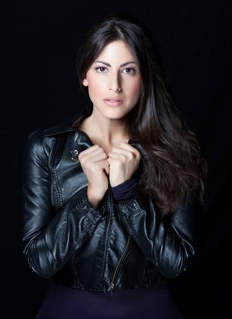 Roni Meron wearing a black leather jacket