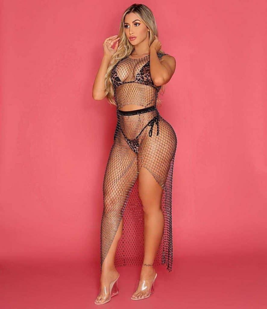 Claudia Sampedro wearing net see through dress