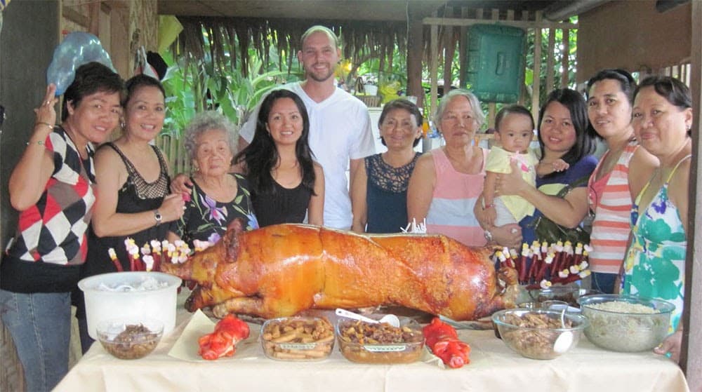 American and Filipina couple with her family