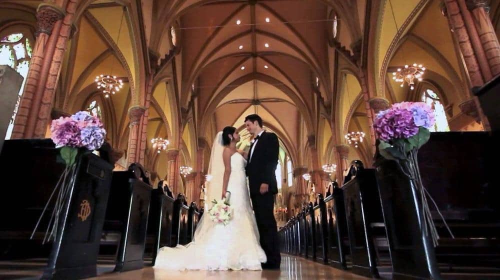 American man with his Filipina wife at the church