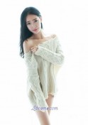 appealing Chinese babe in a sweater